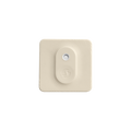 The Shelly BLU H&T ZB Ivory by Shelly Europe is a square, ivory device with rounded corners, raised concentric lines, a central oval area with a small circular opening, and an embossed logo. Shown on a plain white background.
