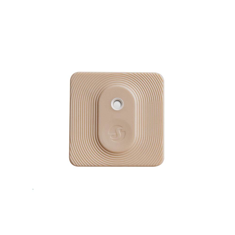 The Shelly BLU H&T ZB List by Shelly Europe is a beige, square adhesive patch with rounded corners and a small circular area in the center, shown on a plain white background.