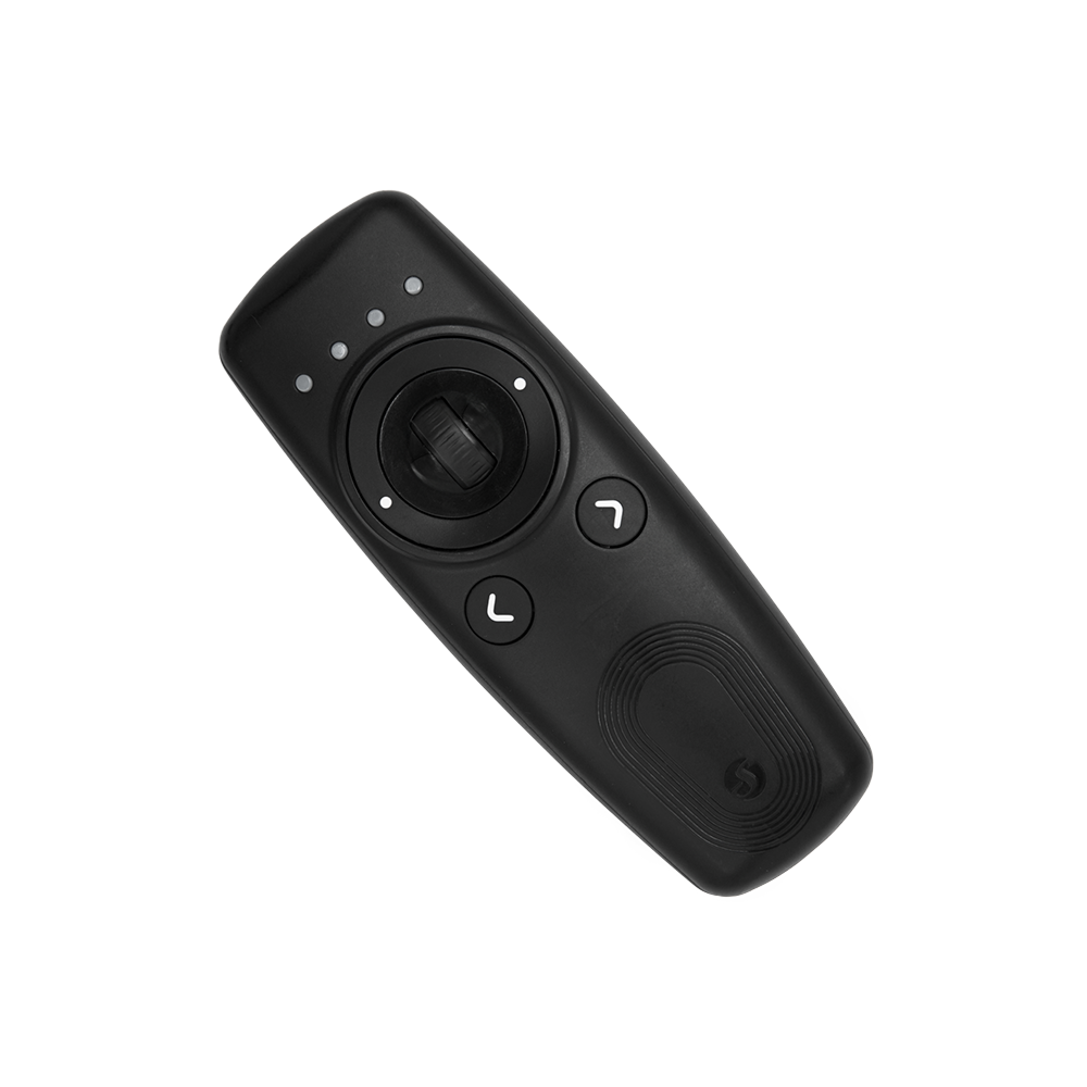 The Shelly USA Shelly BLU Remote Control ZB Black is a black wireless presentation remote with a central joystick, two arrow buttons, LED indicators, and a textured grip, shown on a plain white background.