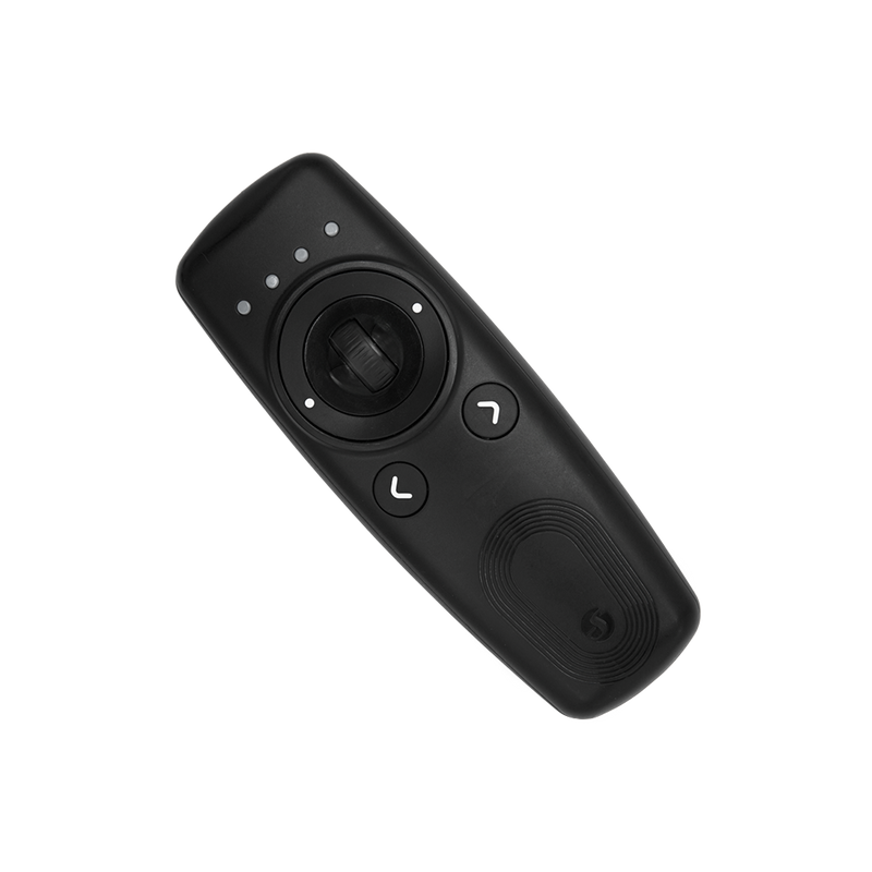 The Shelly USA Shelly BLU Remote Control ZB Black is a black wireless presentation remote with a central joystick, two arrow buttons, LED indicators, and a textured grip, shown on a plain white background.