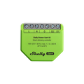 A green Shelly USA Shelly Dimmer Gen4 smart dimming controller featuring labeled connection terminals and technical specs printed on the front.