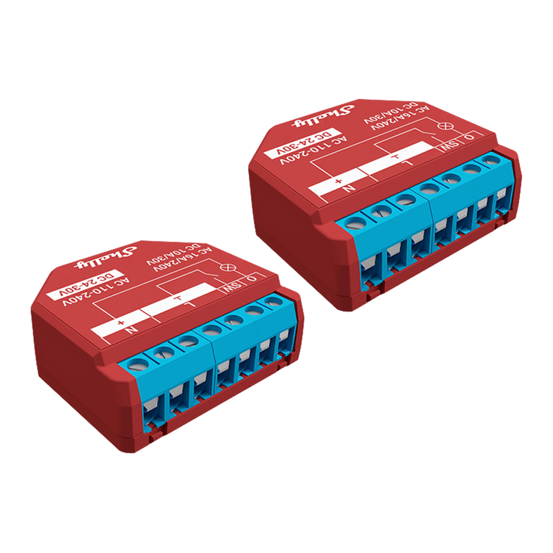 Two Shelly Plus 1PM Non-UL x2 Wi-Fi smart relay switches in red and blue, with labeled connection terminals, displayed at an angle on a white background.