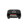 The FrankEver Sprinkler Controller FK-06X by Shelly USA is a black device with a curved top and multiple buttons, showing an orange and gray terminal block inside an open compartment, displayed against a plain white background.