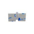 The Shelly Cable Bracket 10-pack from Shelly Europe is a white plastic clip with adhesive foam pads on each side, blue text, and partial 3M branding, designed for mounting objects.