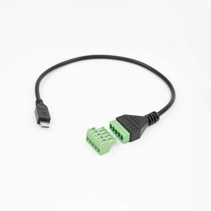 The Shelly USA Micro USB to 5 Terminal Add (Shelly Pill) is a black cable featuring a micro USB connector on one end and two green terminal block connectors, shown on a white background.