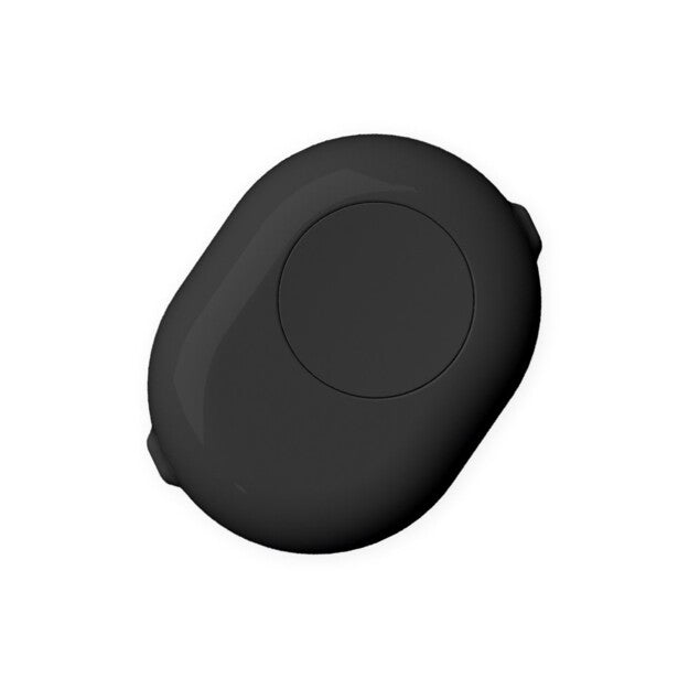 The Shelly Button list by Shelly USA is a small, oval-shaped black electronic device featuring a circular indentation at its center, shown against a plain white background.